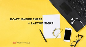 four laptop signs